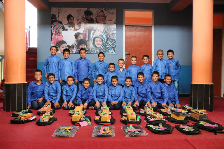 PHO_Children_after receiving school kit and uniform (1)